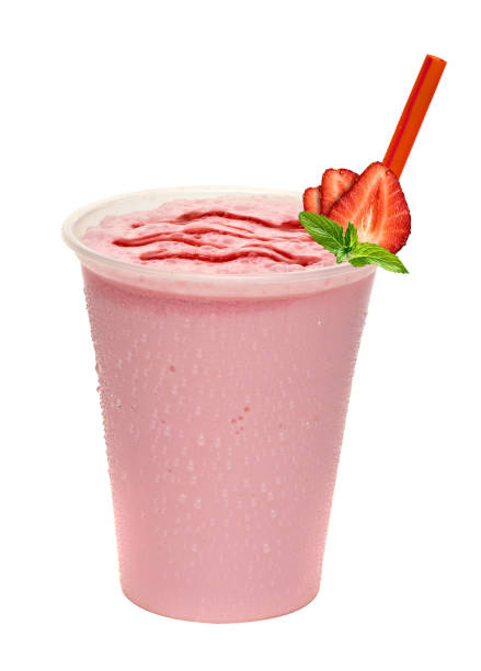 Strawberry milkshake with sauce in takeaway cup isolated on white background.